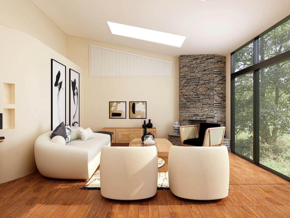 Weißes Sofa in hellem Raum mit großer Fensterfront